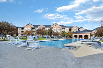 Resort-style swimming pool with sundeck